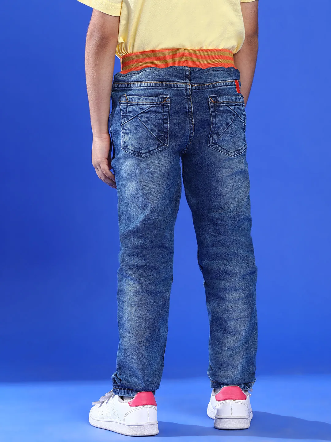 BOYS MID BLUE DENIM CASUAL JOGGERS WITH ORANGE WAISTBAND