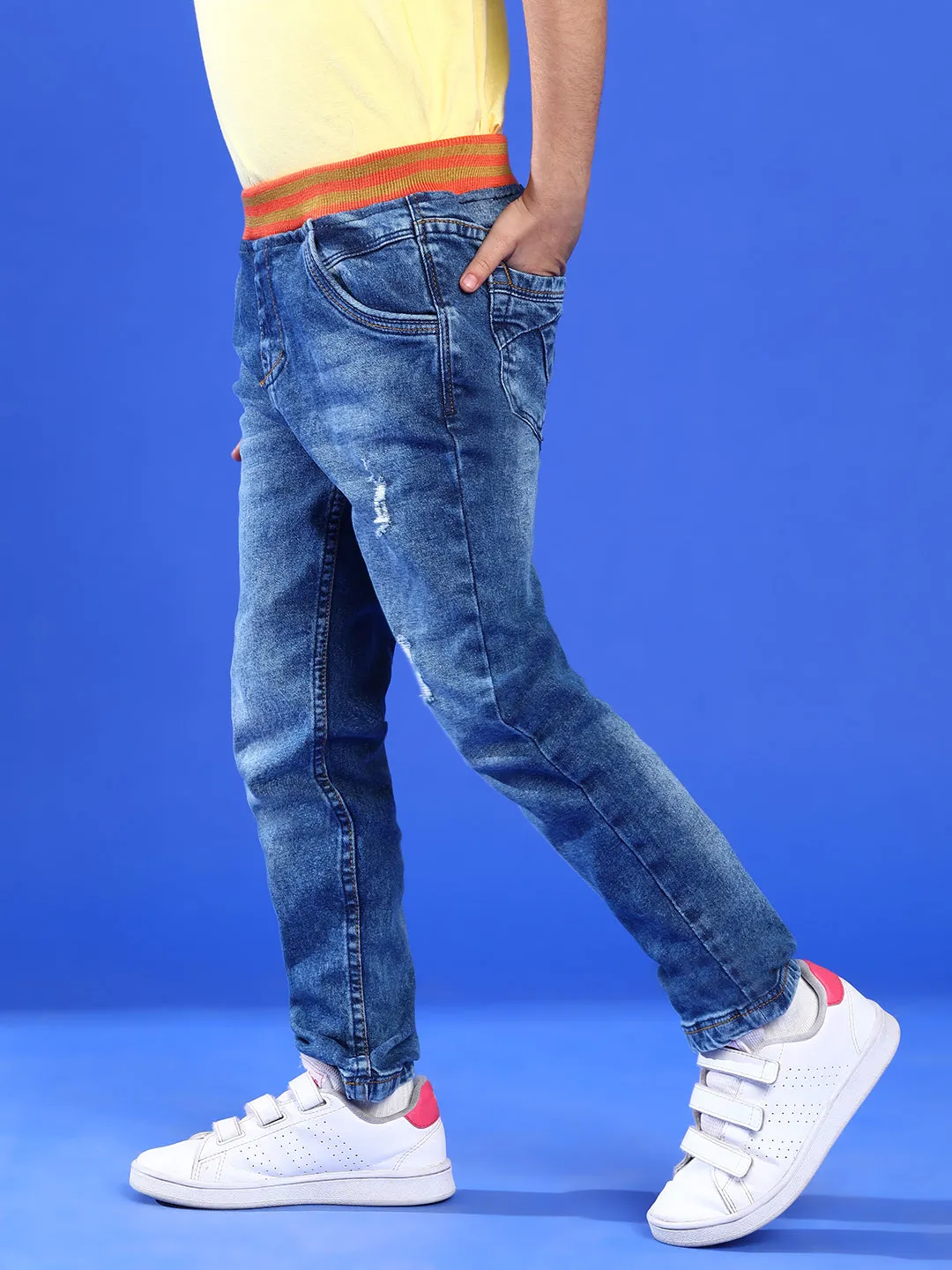 BOYS MID BLUE DENIM CASUAL JOGGERS WITH ORANGE WAISTBAND
